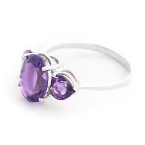 14K. SOLID GOLD RING WITH NATURAL AMETHYSTS